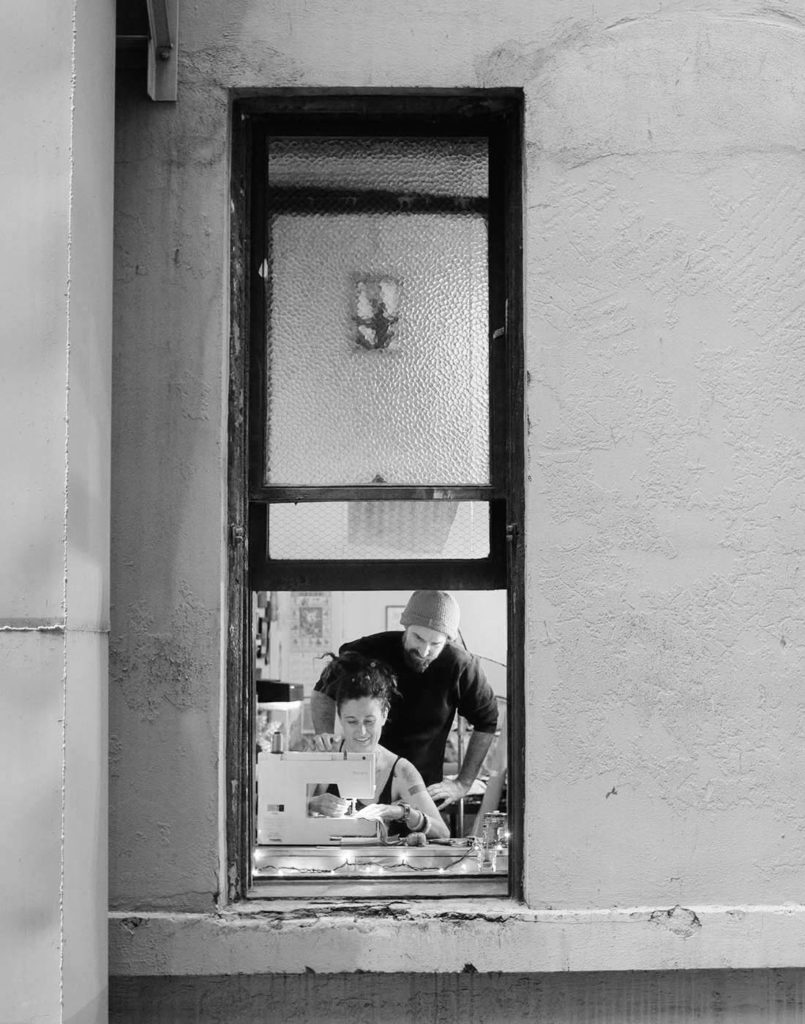couple-window-sewing-downtown-los-angeles